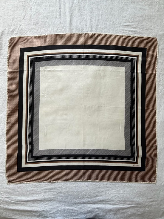 Echo Accessories - Echo Vintage Echo signed rolled-edge silk scarf featuring a brown, black, and wh